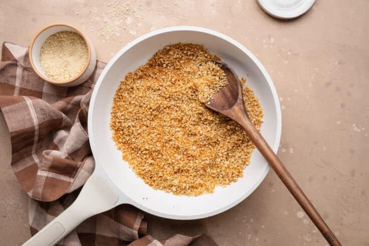Toasting breadcrumbs in a skillet.