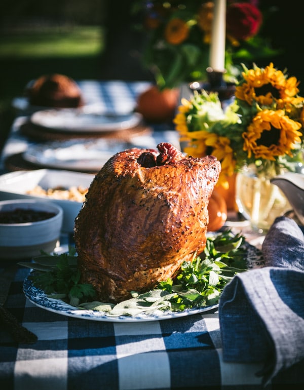 Smoked turkey breast on a Thanksgiving dinner table