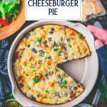 Overhead image of a Bisquick cheeseburger pie in a round dish with text title overlay