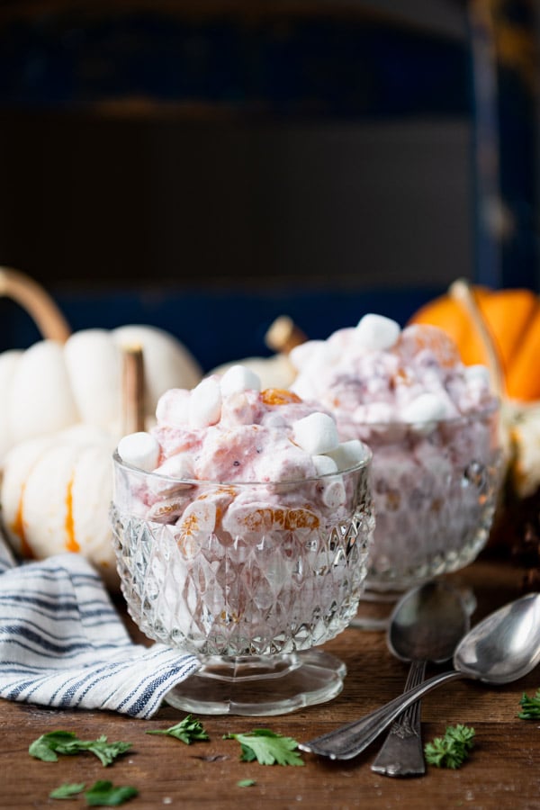 Side shot of cranberry fluff with cool whip on a table
