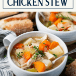 Side shot of a bowl of slow cooker chicken stew with text title box at top