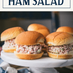 Ham salad recipe served on sandwich buns with text title box at top
