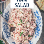 Overhead image of a bowl of ham salad with text title overlay