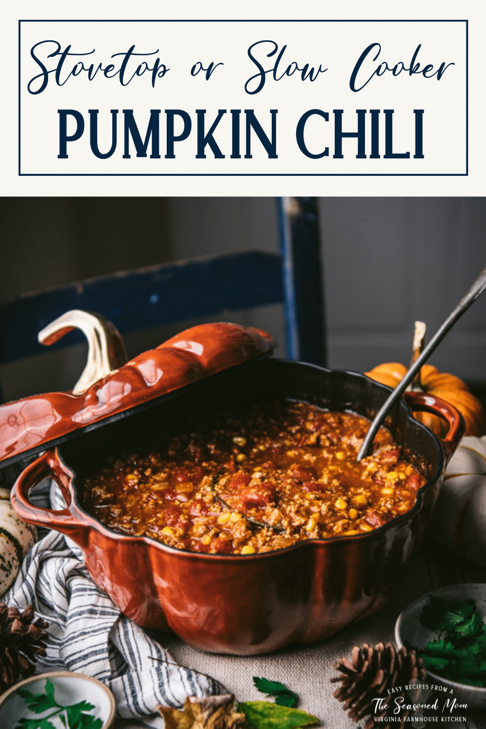 Pot of pumpkin chili with ladle and text title box at top