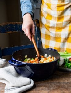 Cooking vegetables in a Dutch oven.