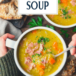 Overhead shot of hands eating a bowl of split pea soup with ham and text title overlay.