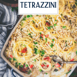 Overhead shot of a pan of turkey tetrazzini with text title overlay