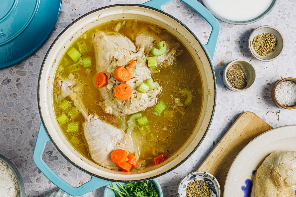 Making the chicken broth for a chicken and dumpling soup recipe.