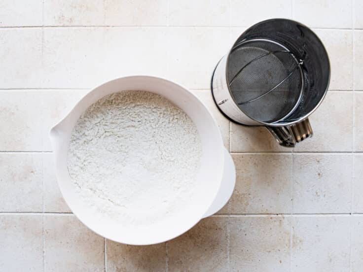 Flour sifted for a pound cake recipe.