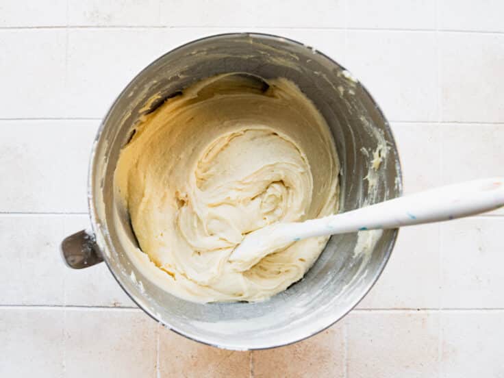 Batter for a vanilla pound cake recipe in a bowl.