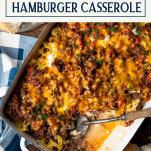 Overhead shot of a pan of hamburger noodle casserole with text title box at top.