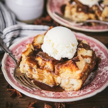 Square side shot of bread pudding on a plate