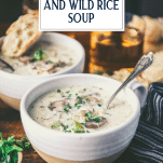 Side shot of a bowl of creamy chicken and wild rice soup with text title overlay