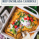 Overhead image of a pan of easy ground beef enchilada casserole with text title box at top.