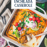 Spoon in a dish of easy beef enchilada casserole with text title overlay.