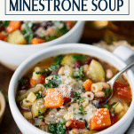 Side shot of a spoon in a bowl of easy minestrone soup with text title box at top.