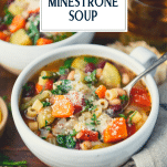 Close up side shot of a bowl of minestrone soup with text title overlay