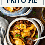 Overhead shot of a spoon in a bowl of frito pie with text title box at top