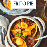 Overhead shot of two bowls of frito pie with text title overlay