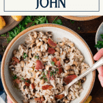 Eating a bowl of hoppin john with a fork and text title box at top.