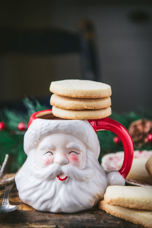 Scottish shortbread cookies stacked on a Santa mug.
