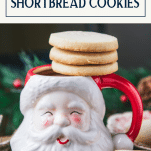 Shortbread cookies on top of a Santa mug with text title box at top.