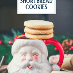 Shortbread cookies stacked on a mug with text title overlay.