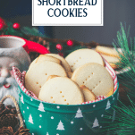 Tin of shortbread cookies with text title overlay.