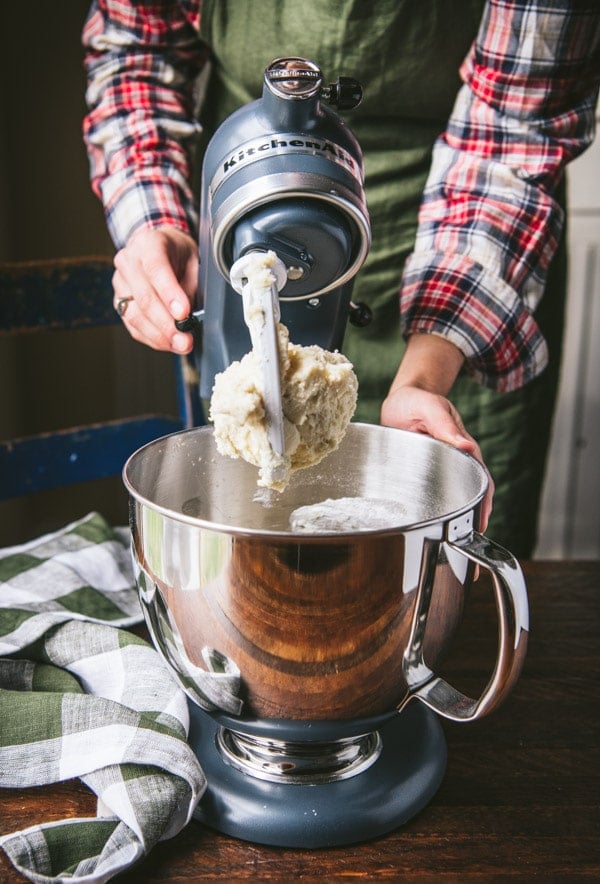 Cookie dough in a stand mixer.