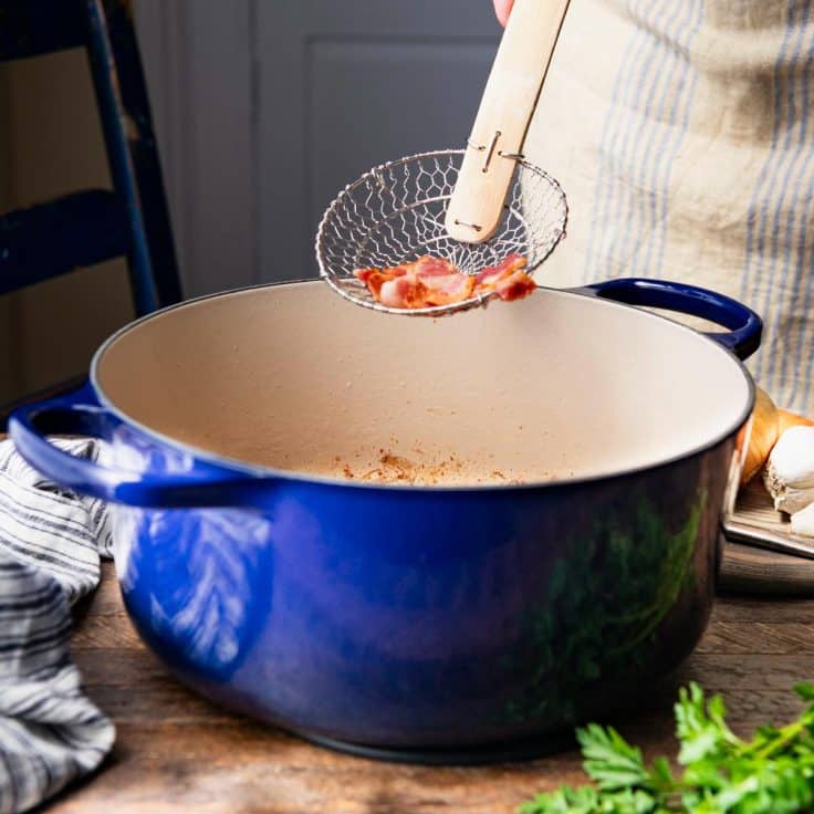 Frying bacon for beef burgundy.
