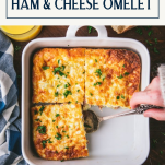 Hands serving a baked ham and cheese omelet with text title box at top.