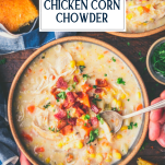 Spoon eating a bowl of crock pot chicken corn chowder with bacon and text title overlay