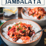Close up side shot of crockpot jambalaya in a bowl with text title box at top