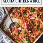 Overhead shot of hawaiian chicken and rice bake with text title box at top