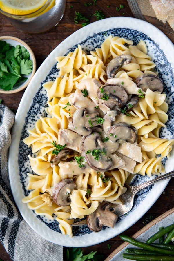 Close overhead image of the best chicken marsala recipe served over noodles