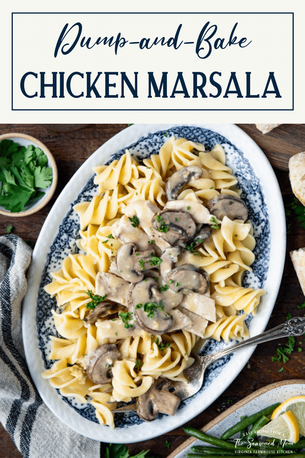 Chicken marsala with pasta on a dinner table with text title box at top