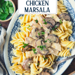 Close overhead shot of chicken marsala with text title overlay