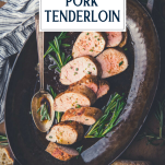 Sliced pork tenderloin in a pan with text title overlay
