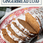 Close up shot of sliced gingerbread cake on a tray with text title overlay