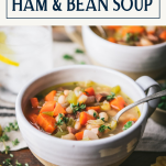 Side shot of a bowl of ham and bean soup with text title box at top.