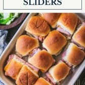 Hot ham and cheese sliders on hawaiian rolls with text title box at top.
