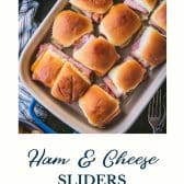 Hot ham and cheese sliders on hawaiian rolls with text title at the bottom.