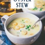Close up side shot of oyster stew in a bowl with text title overlay