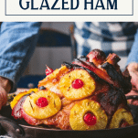 Serving pineapple and cherry ham with text title box at top.