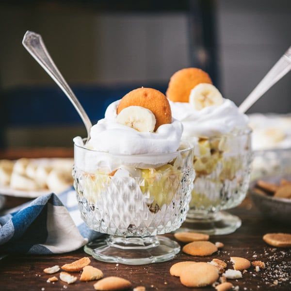 Two glass dishes full of easy banana pudding with nilla wafers.