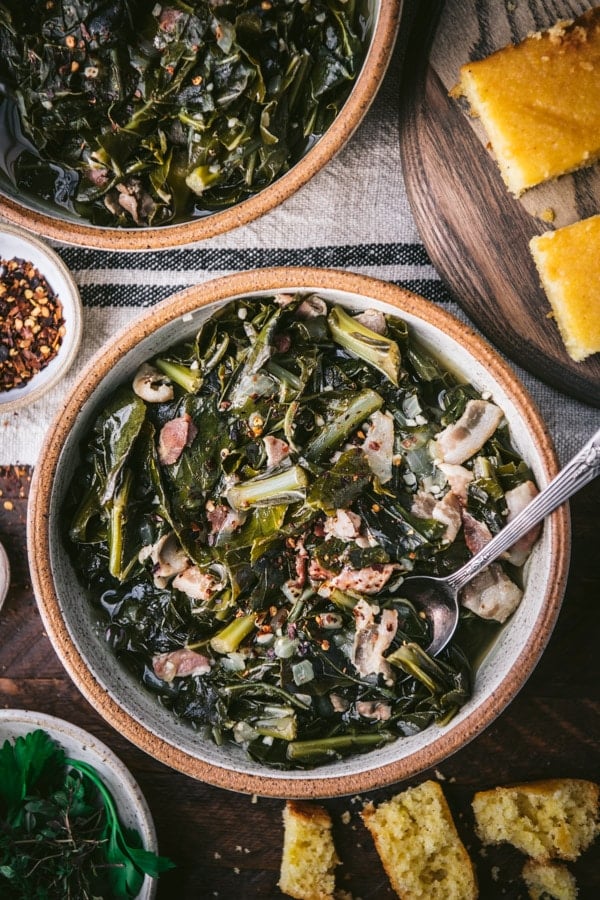 Overhead shot of a bowl of southern collard greens with bacon.