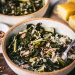 Side shot of Southern collard greens recipe served with cornbread