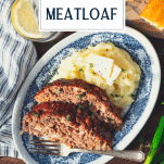 Overhead shot of a plate of southern style meatloaf recipe on a plate with mashed potatoes and a text title overlay