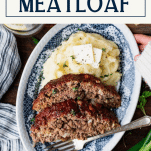 Hands holding a plate of Southern meatloaf with text title box at top