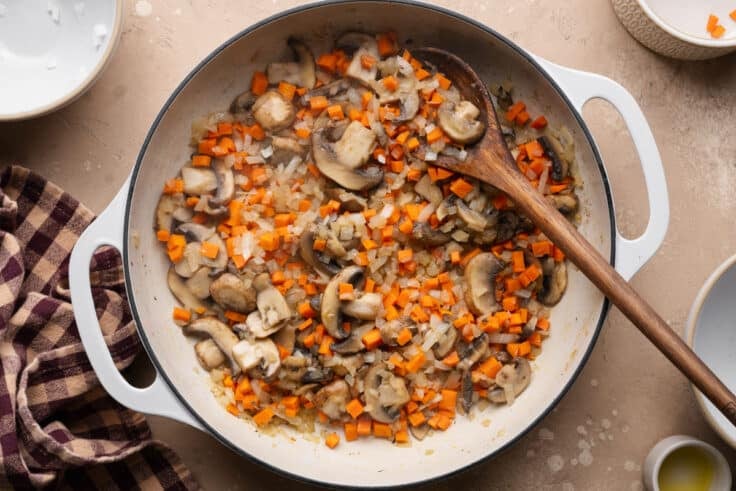Sauteing the vegetables.